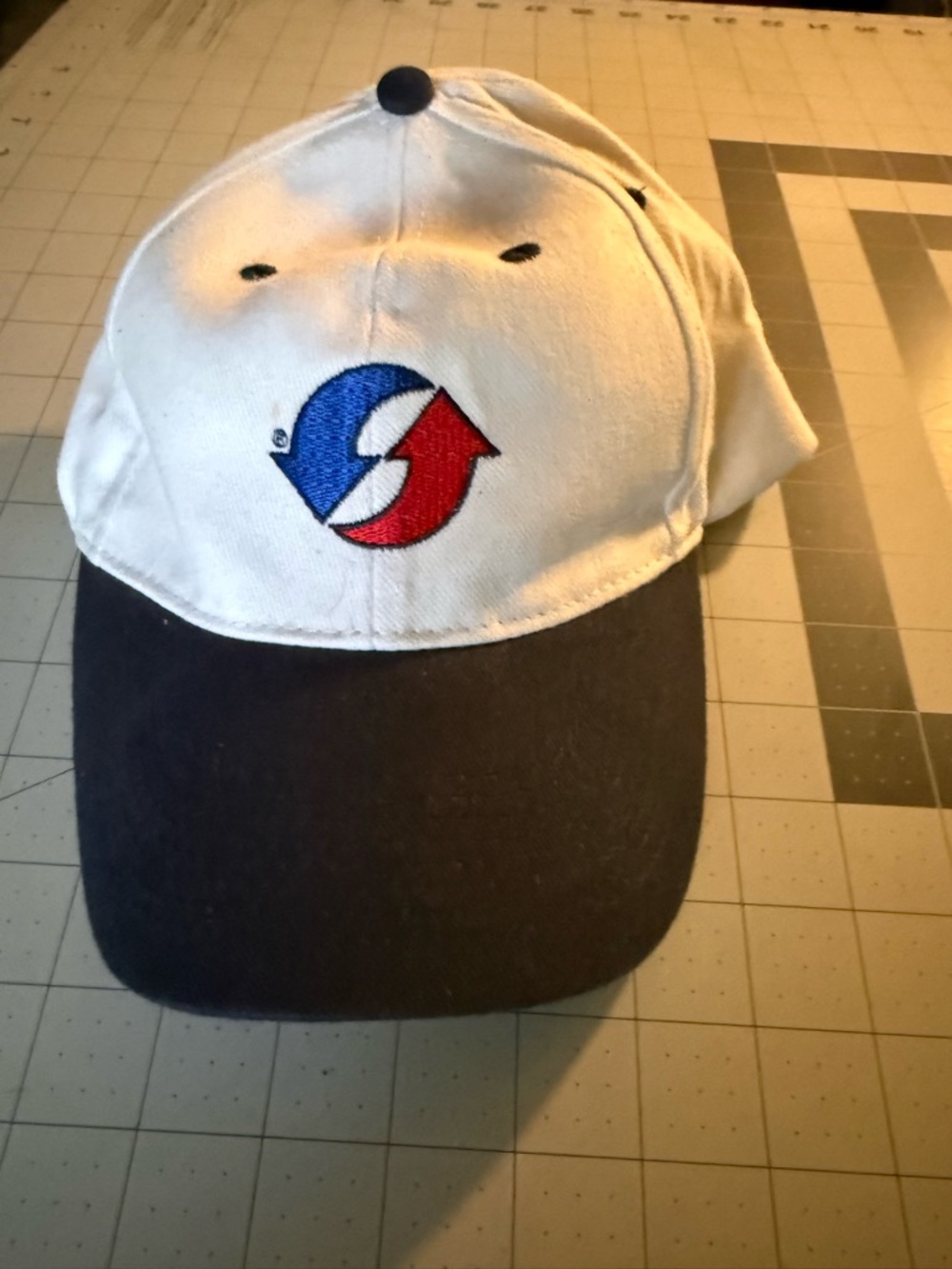 OTTO White Cap with Navy Bill and Red & Blue Arrow Detail